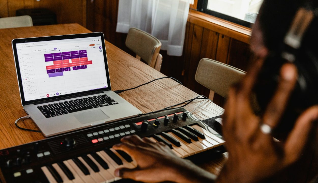 macbook pro on brown wooden table
