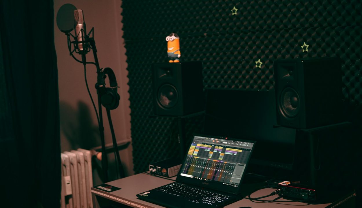 a laptop computer sitting on top of a desk
